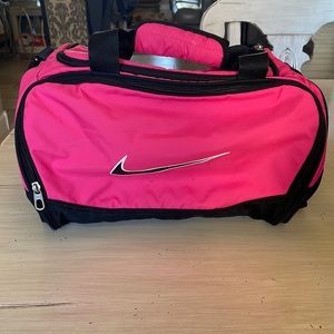 small pink nike duffel bag